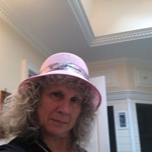 Super cute pink hat with floral ribbon